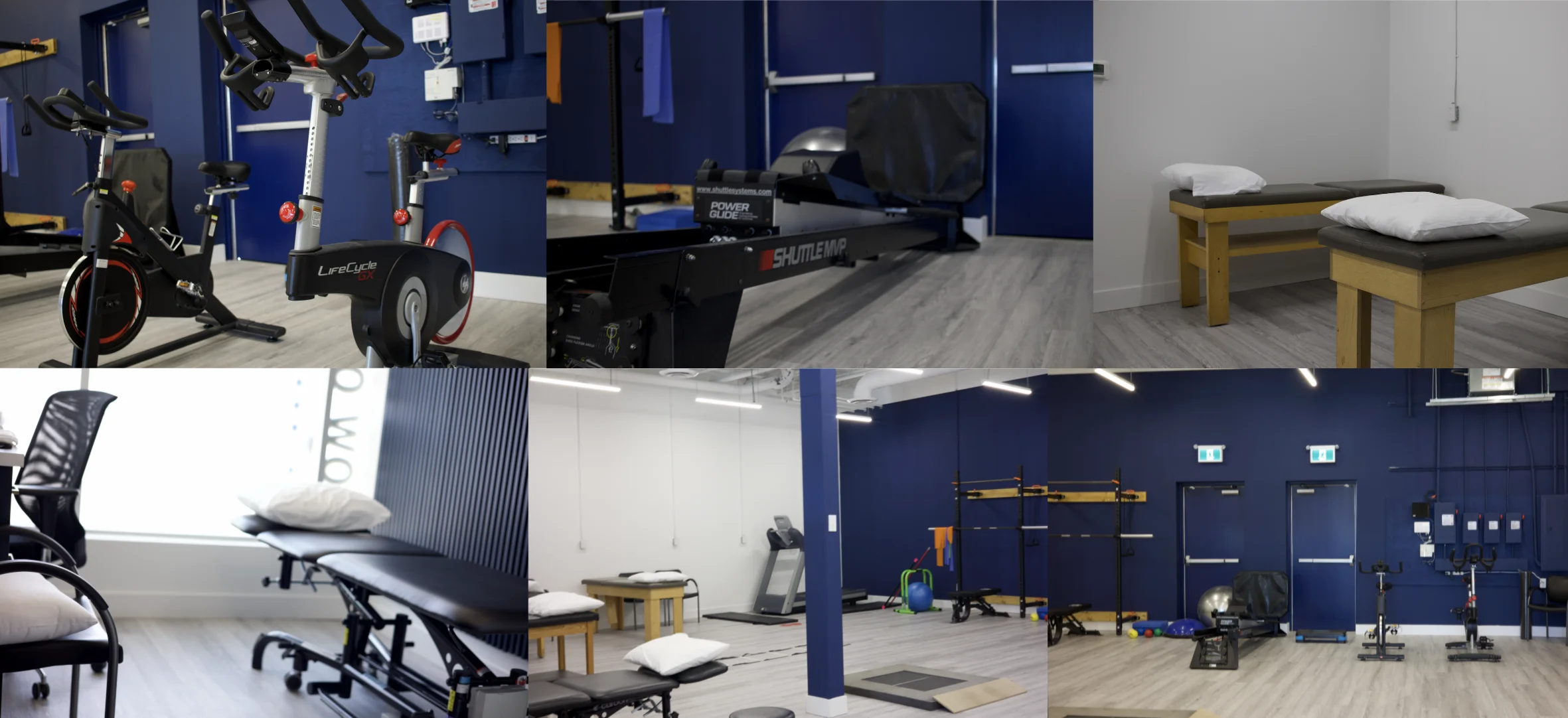 A modern physiotherapy clinic featuring exercise bikes, a rowing machine, therapy tables with pillows, a treadmill, and an open workout area with blue walls, grey flooring, and rehabilitation equipment neatly arranged.